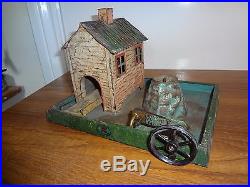 A German Doll et Cie live steam engine driven toy tinplate water fountain pump