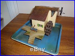 A German Marklin live steam engine driven toy model tinplate watermill pump