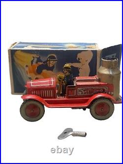 Arnold Tin Lithographed Windup Penny Toy Steam Fire Engine Truck Nos
