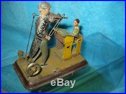 Becker Violinist & Student Tin Painted & Litho Steam engine Toy articulated
