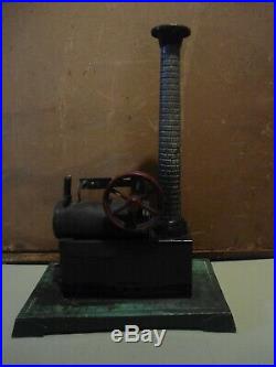 C. 1890 toy steam engine/ original burner funnel and stack. Nice original