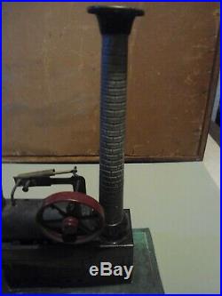 C. 1890 toy steam engine/ original burner funnel and stack. Nice original