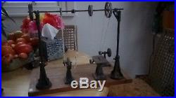Toy steam engine workshop working drive shaft with grinders and saw bench